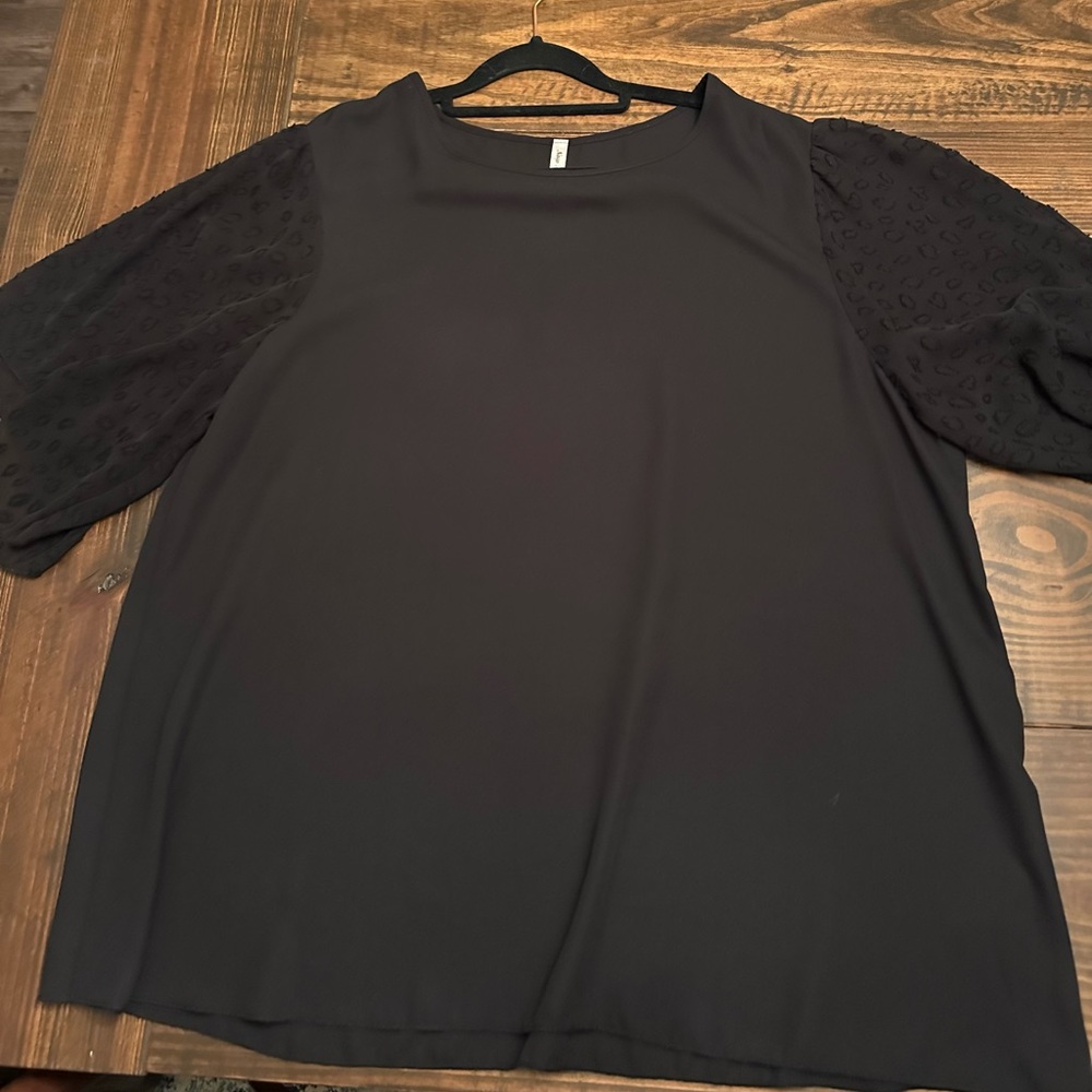 Boutique short sleeve Black top with Sheer Leopard sleeve